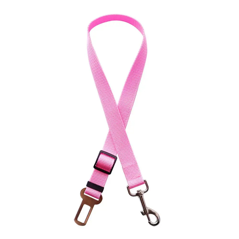 Pink adjustable dog seatbelt with metal clip and buckle.