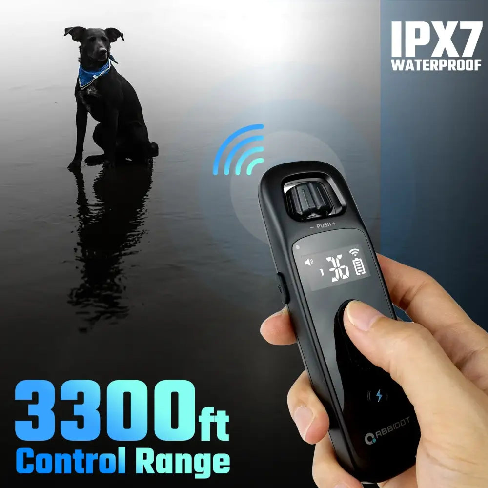 Handheld remote control device for dog training with a digital display and waterproof rating.