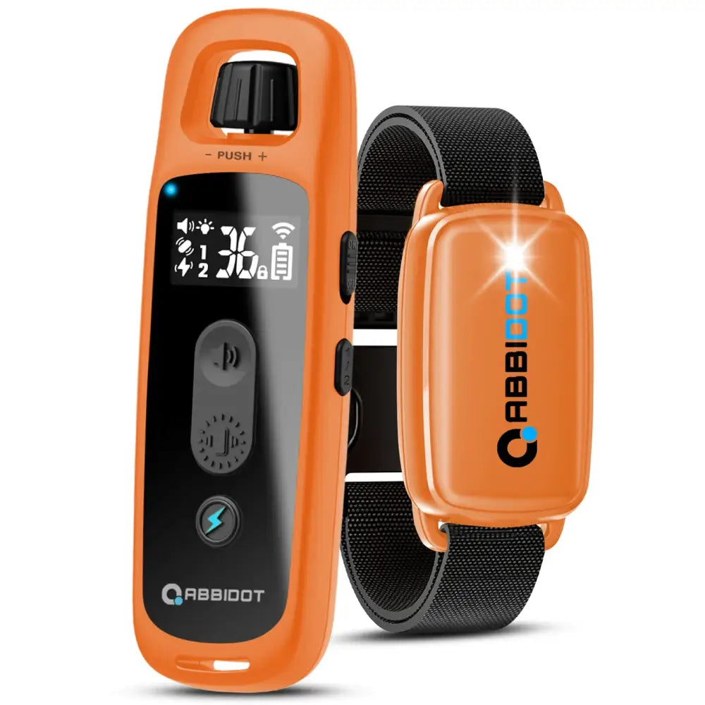 Orange electronic device with a digital display and accompanying wristband, likely a fitness tracker or smart wearable.