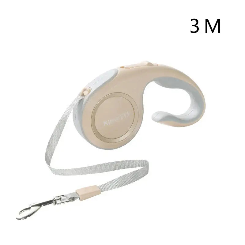 Retractable dog leash with a beige plastic casing and white strap.