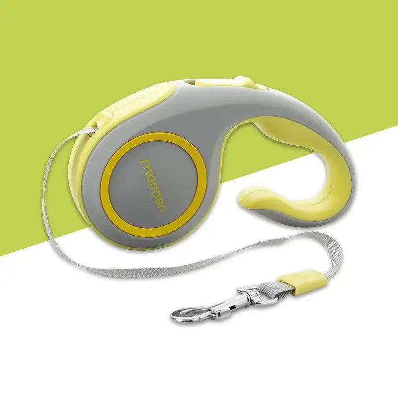 Retractable dog leash with a gray and yellow color scheme.