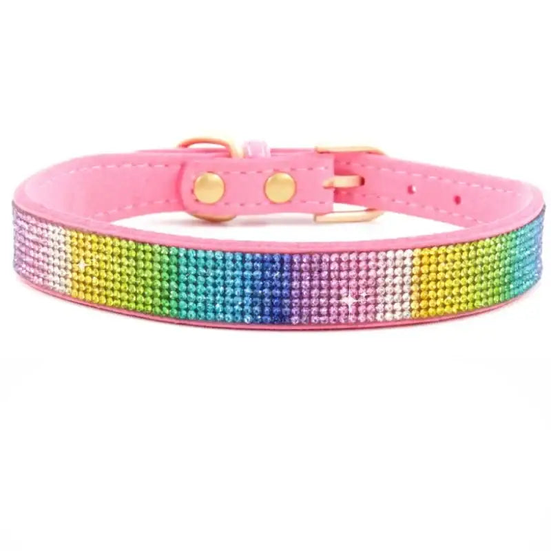 Pink leather dog collar with a rainbow rhinestone band.