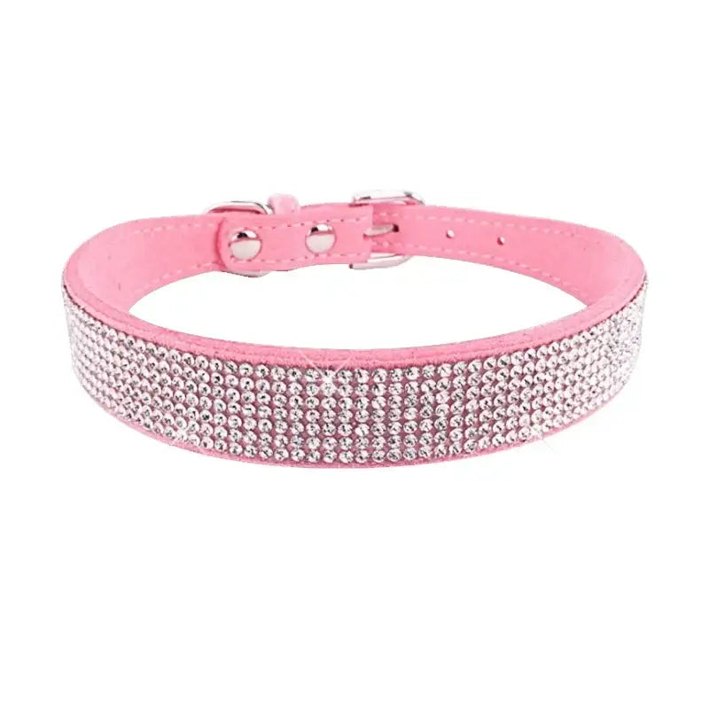 Pink leather dog collar adorned with rhinestones.