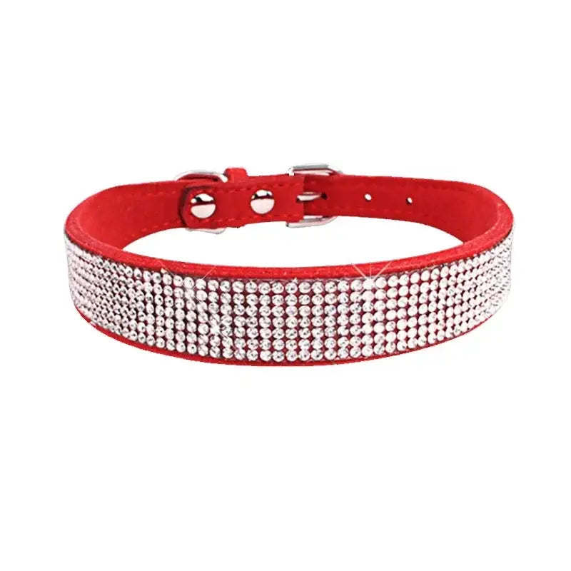 Red leather dog collar adorned with rhinestones.