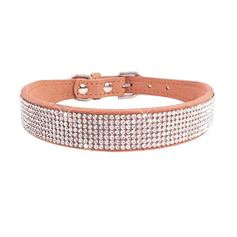 Sparkly rhinestone-encrusted pink leather dog collar with a buckle.