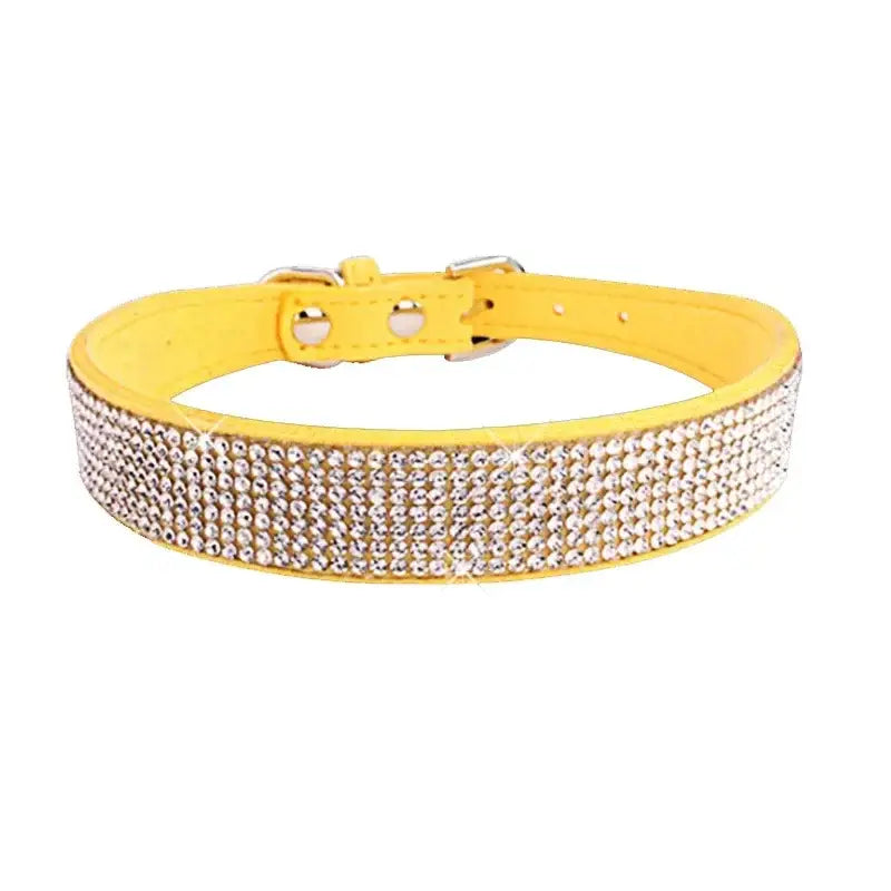 Yellow leather dog collar adorned with rhinestones.