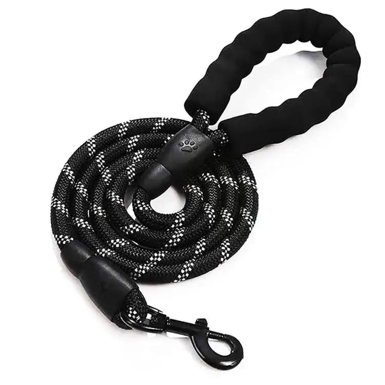 Black and white braided dog leash with a loop handle and clip.