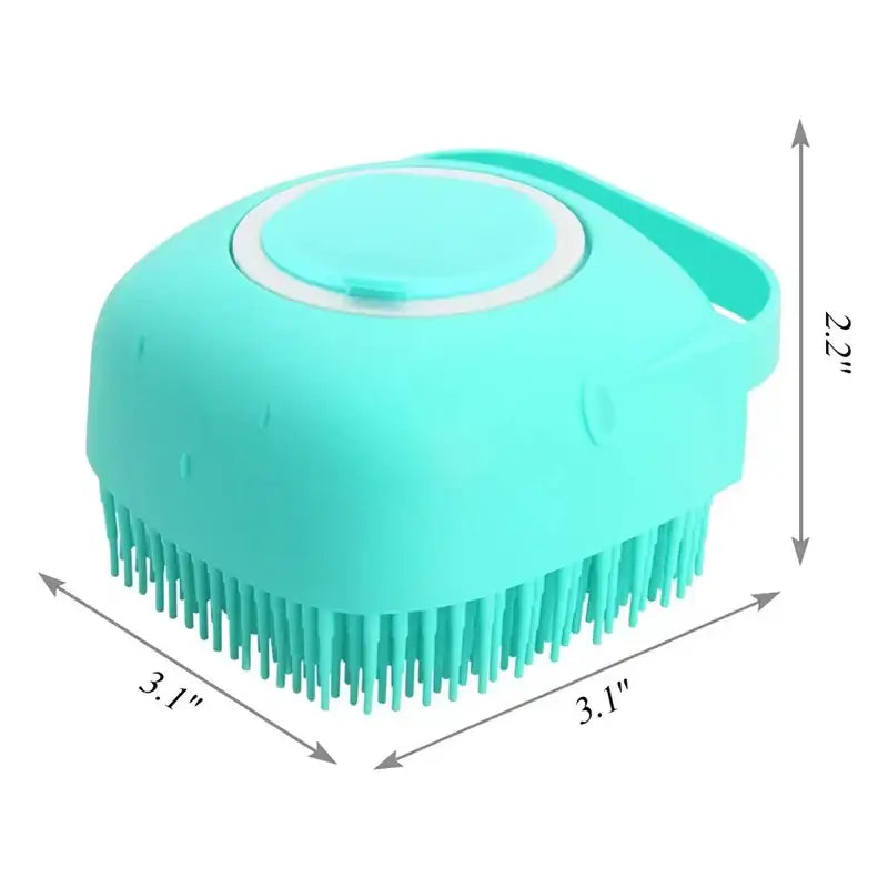 Turquoise silicone pet grooming brush with soft bristles and a circular handle on top.