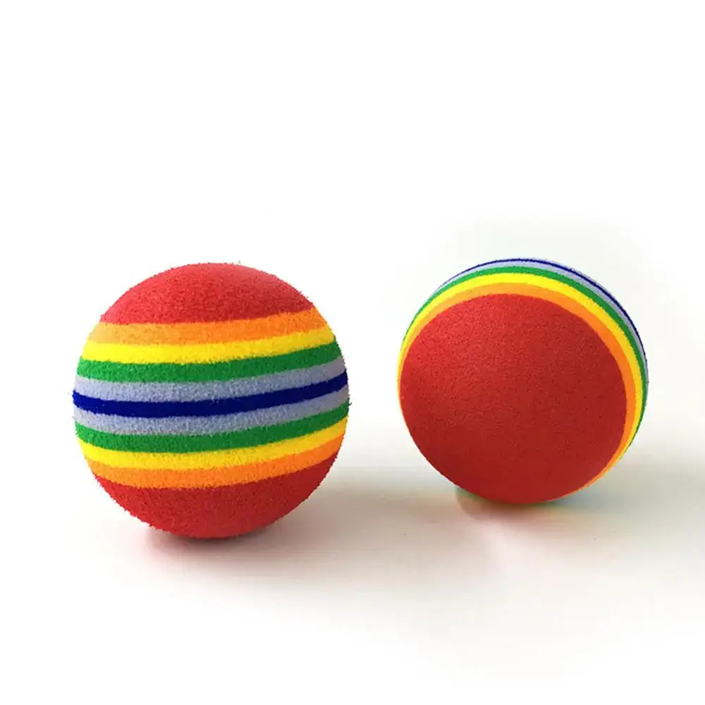 Colorful striped foam balls with rainbow patterns.