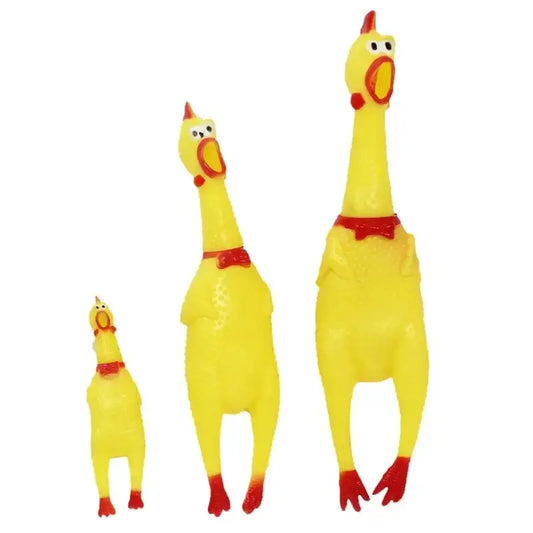 Three yellow rubber chicken toys with red accents.