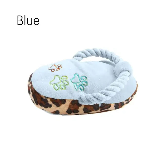 Pet bed with a light blue cushion and leopard print trim.