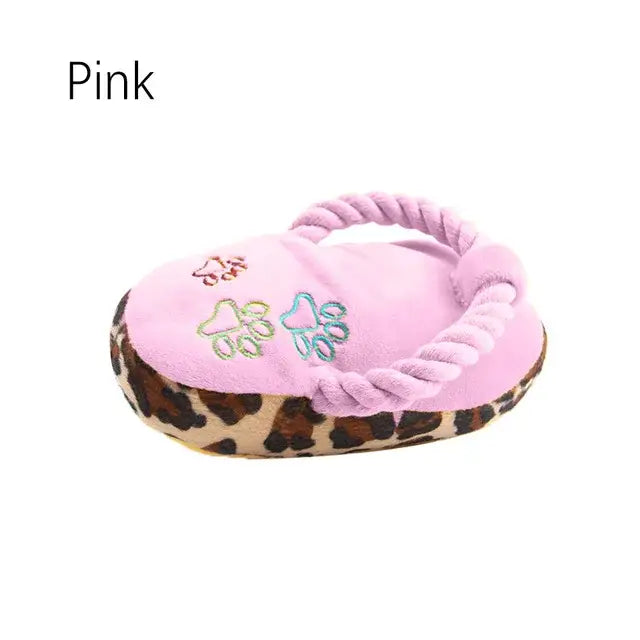 Pink heart-shaped pet bed with floral designs and animal print trim.