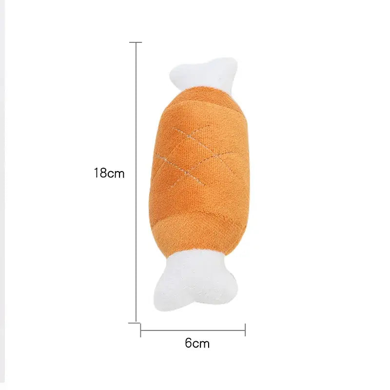 Plush toy shaped like a bread loaf or baguette with white ends.