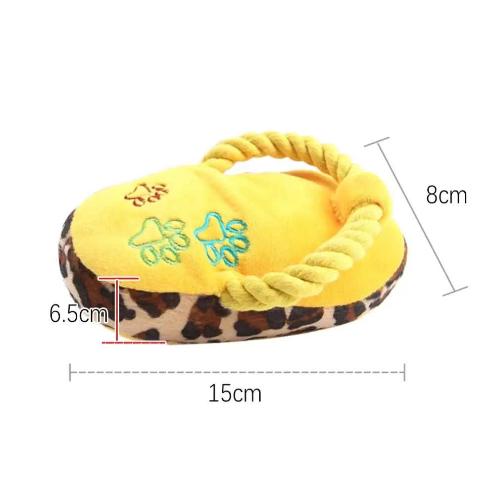 Yellow flip-flop shaped dog toy with a leopard print base and rope handle.