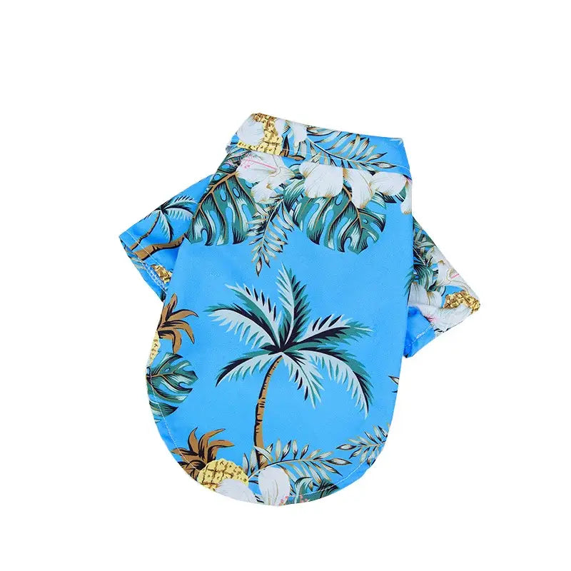 Hawaiian-style shirt for a dog with a blue tropical palm tree print.