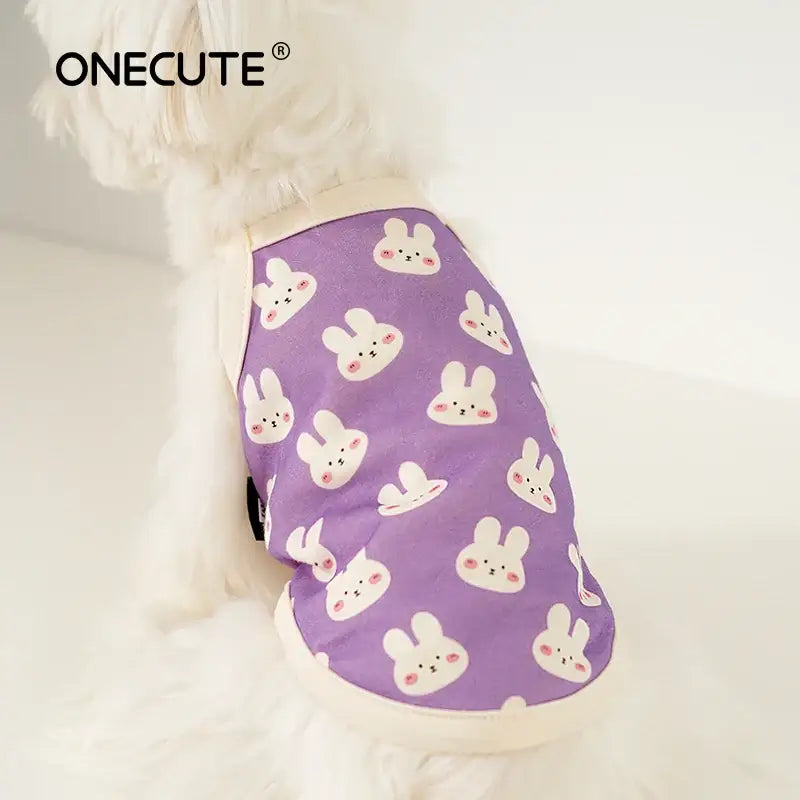 Purple pet shirt with white bunny face pattern.