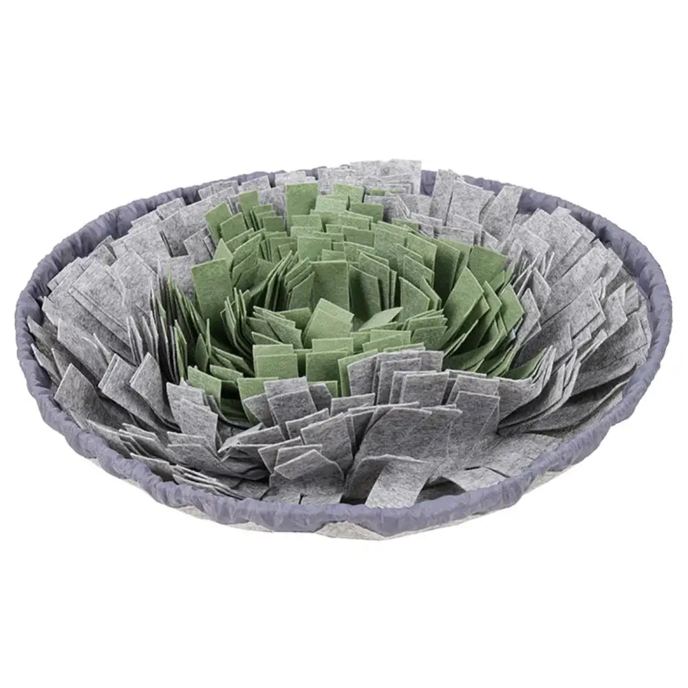 Circular snuffle mat with gray outer layers and green inner layers for pet enrichment.