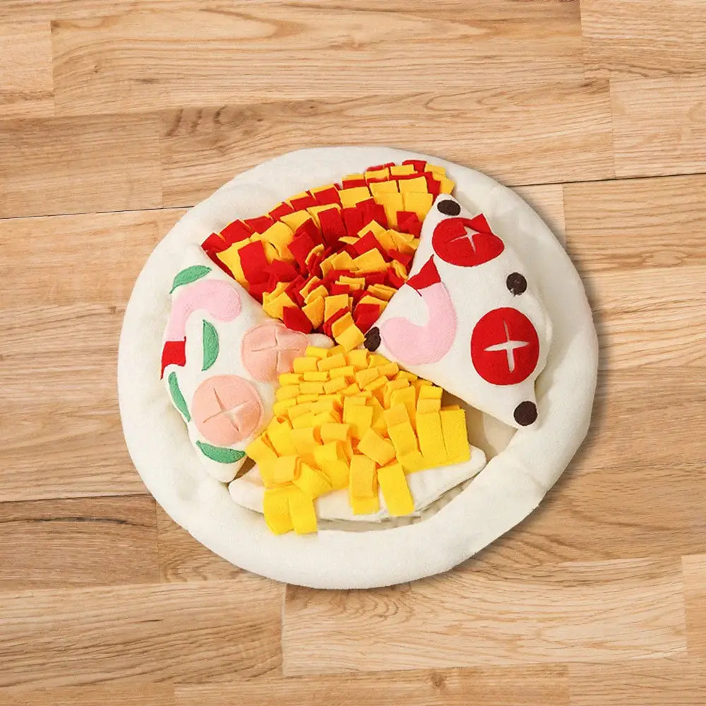 Felt play food pizza on a white plate.