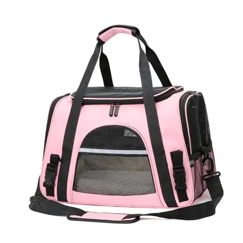 Pink and black pet carrier with mesh windows and shoulder strap.