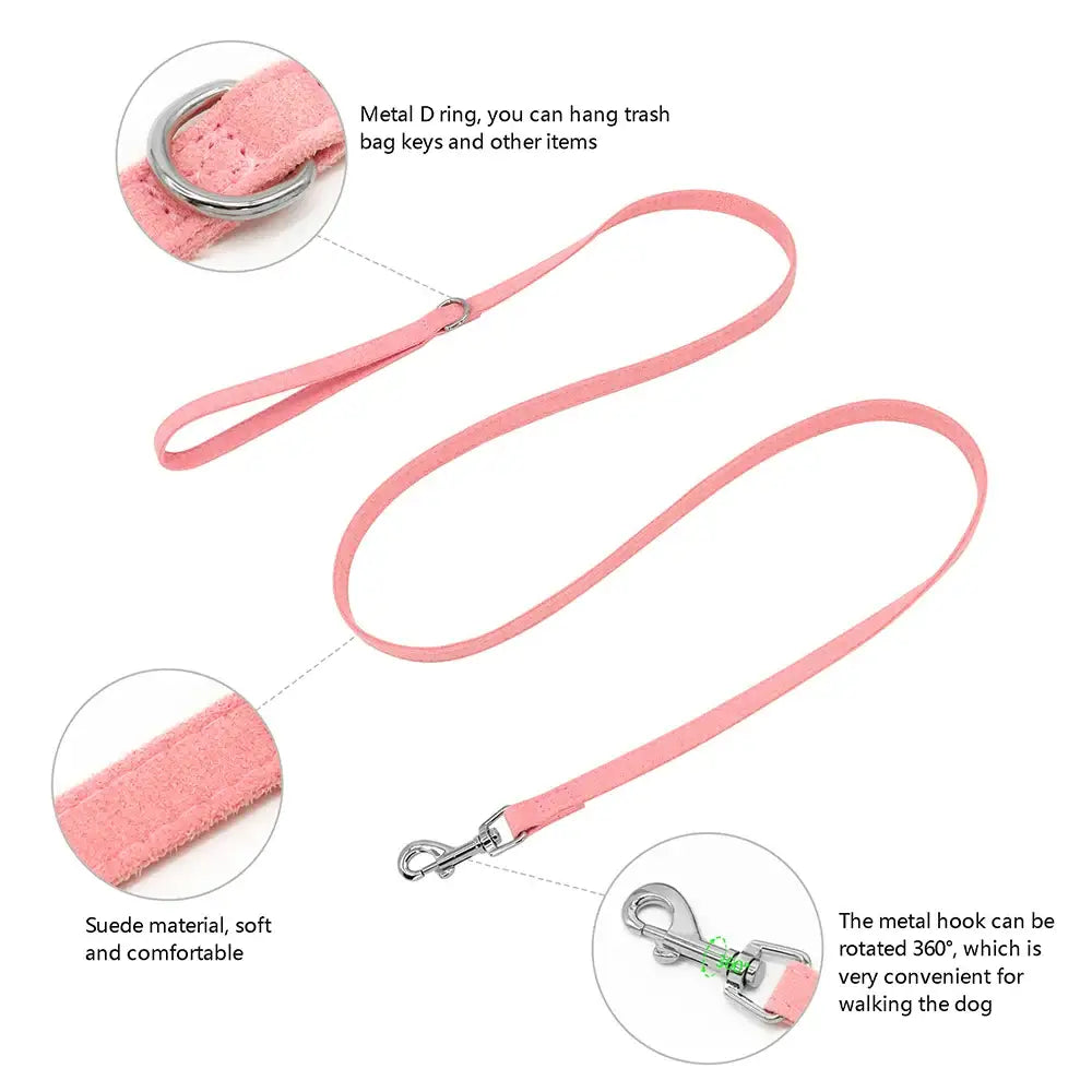 Pink suede dog leash with metal clips at both ends.