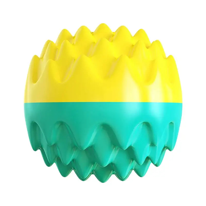 Spherical toy or ball with yellow spiky top half and teal spiky bottom half.