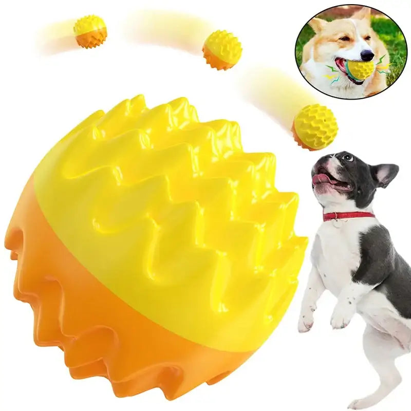 Yellow and orange spiky rubber ball toy for dogs.