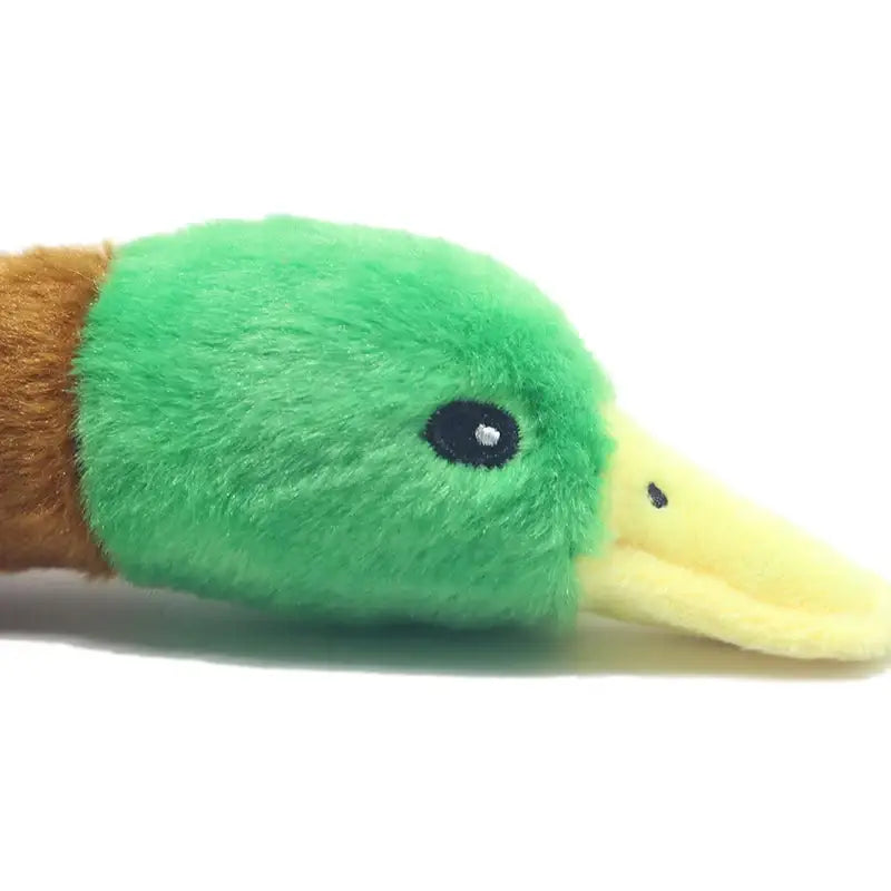 Plush toy duck with a green head and yellow beak.