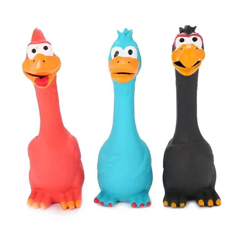 Three colorful rubber duck-like toys with long necks and cartoon faces.