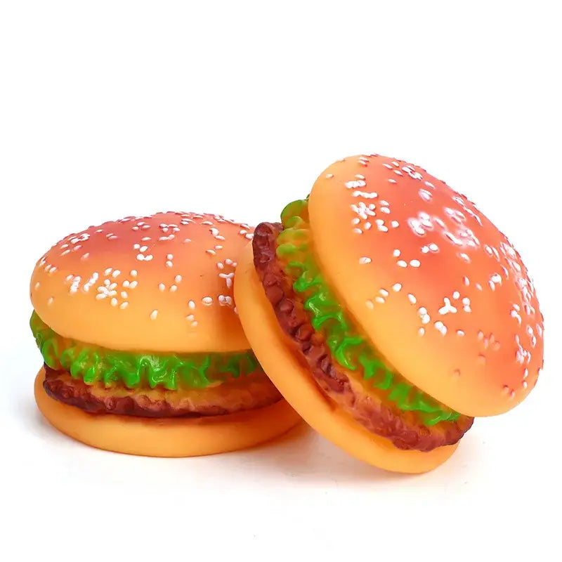 Two cartoon-style hamburgers with sesame seed buns, lettuce, and meat patties.