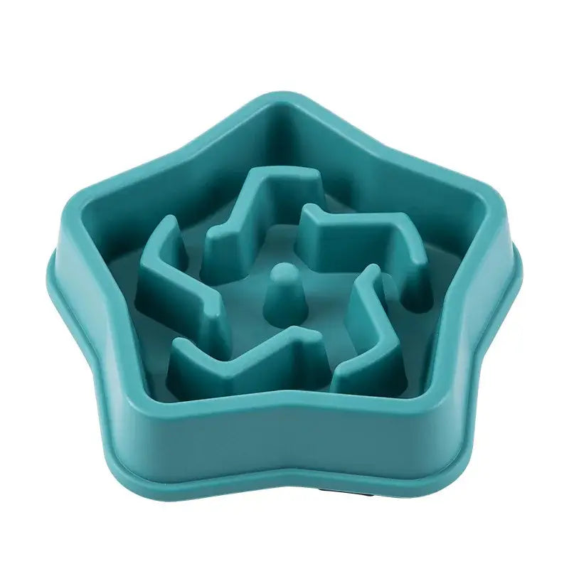 Star-shaped teal plastic pet food bowl with a maze-like interior design.