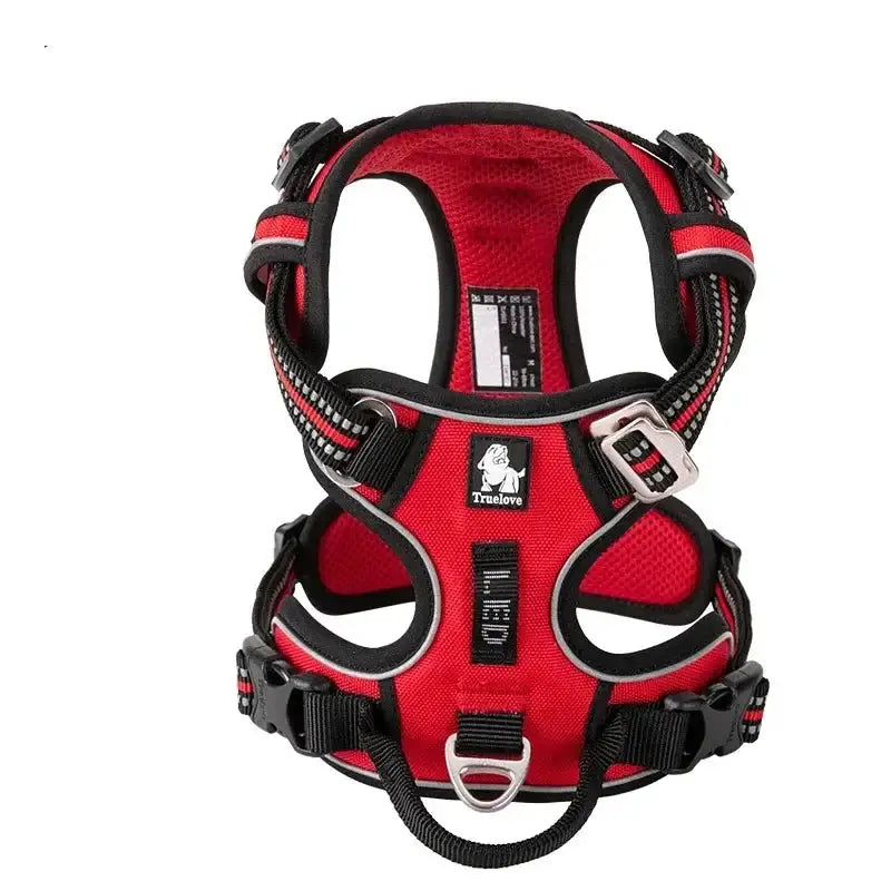 Red and black padded dog harness with adjustable straps and metal buckles.