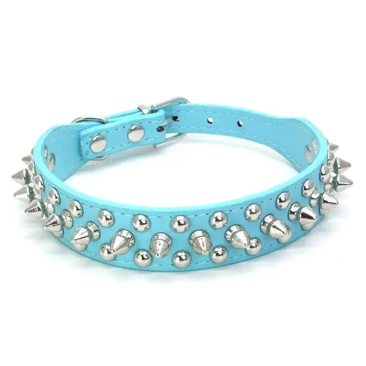 Bright blue leather dog collar adorned with silver spikes and studs.