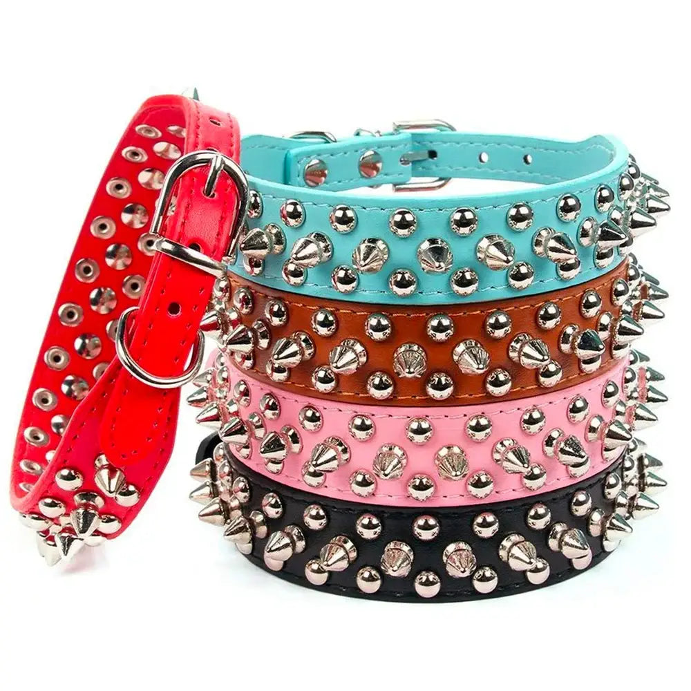 Colorful spiked dog collars in red, turquoise, brown, pink, and black.