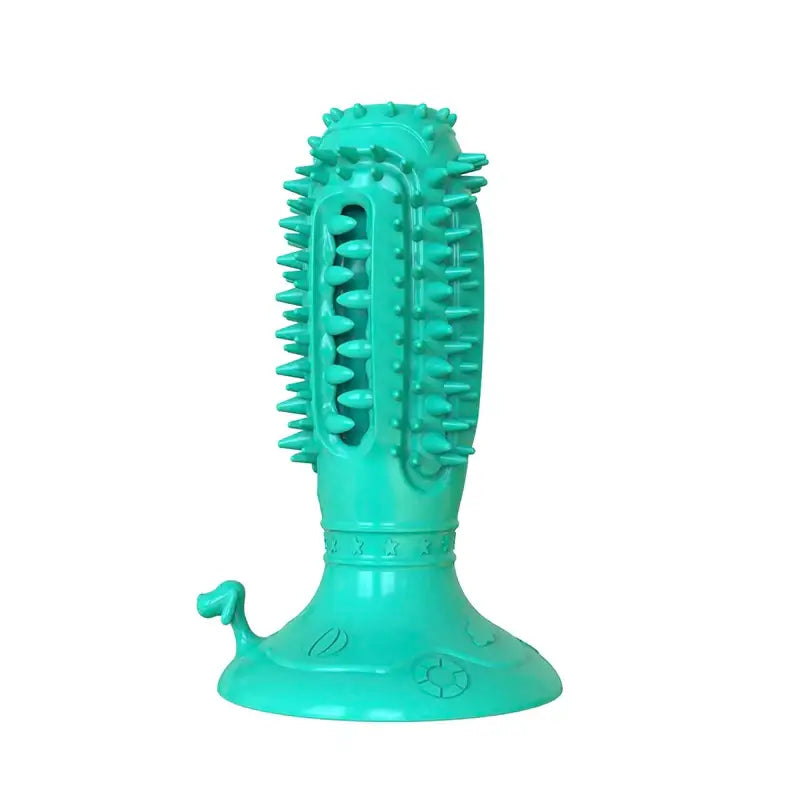 Teal-colored dog chew toy with textured spikes and a suction cup base.