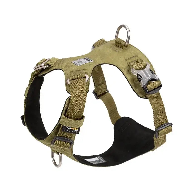 Tactical dog harness in a tan/khaki color with adjustable straps and metal hardware.