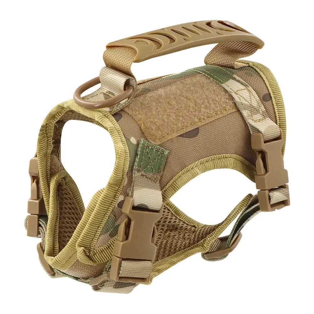 Tactical military-style dog harness in camouflage colors with adjustable straps and a handle.