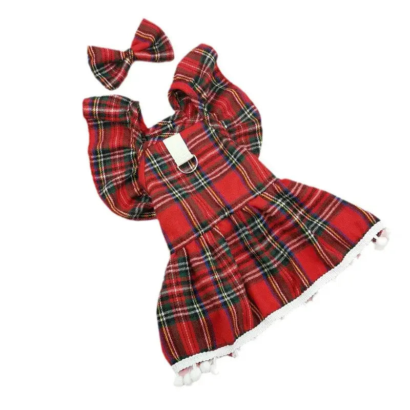 Red plaid dress with a matching bow accessory and white lace trim.