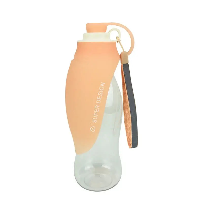 Collapsible silicone water bottle with a peach-colored top and white bottom.