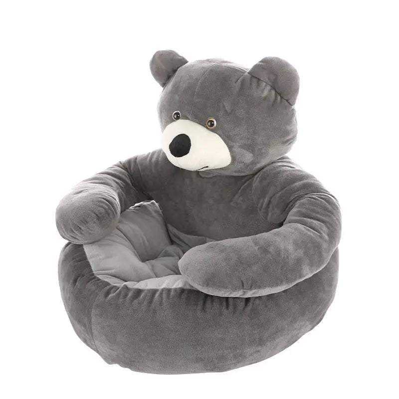 Gray plush teddy bear-shaped children’s chair with soft, huggable arms.