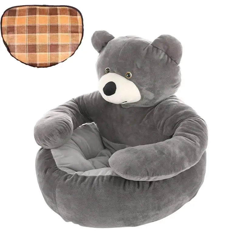 Plush gray teddy bear-shaped children’s chair with soft, huggable arms.