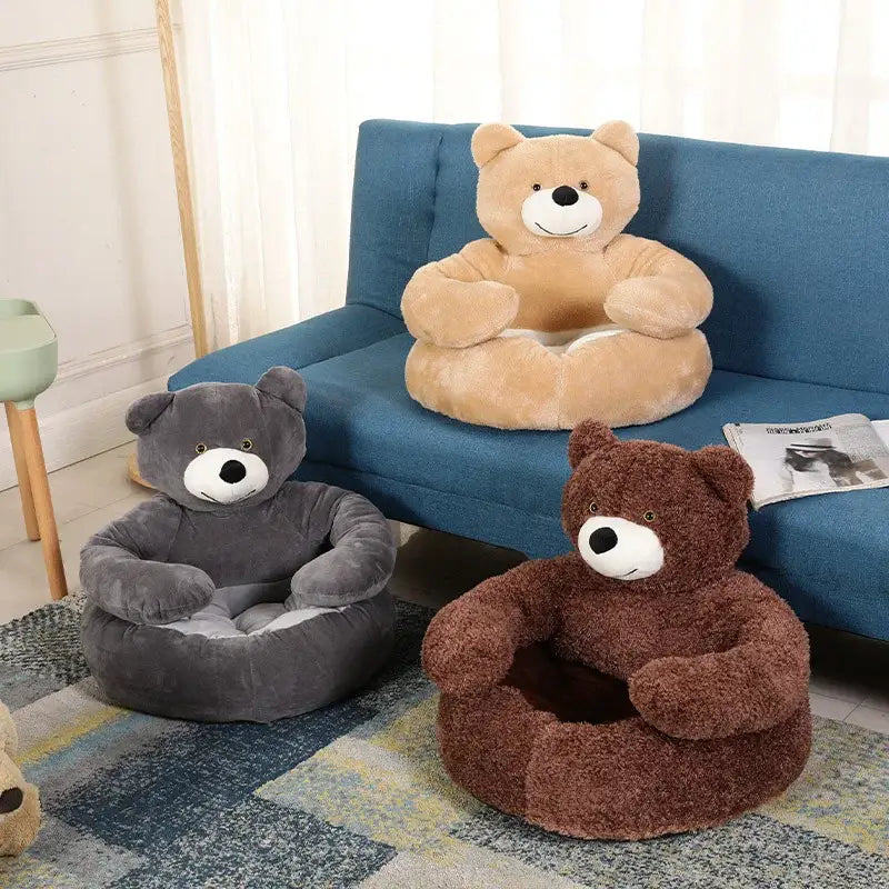 Plush teddy bear-shaped children’s chairs in three different colors.