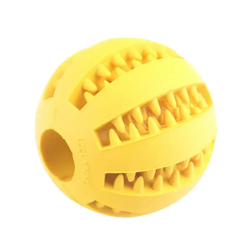 Yellow rubber ball with ridged patterns and a hollow center.