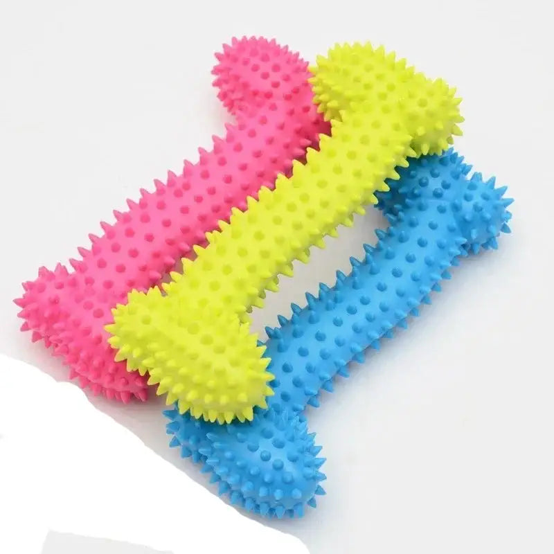 Colorful rubber dog chew toys shaped like bones with textured spikes.