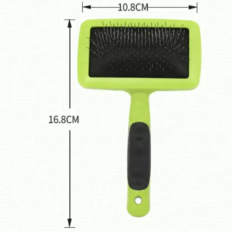 Pet grooming brush with a lime green handle and black bristles.