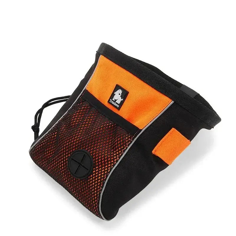 Dog treat pouch in black and orange with a mesh pocket.