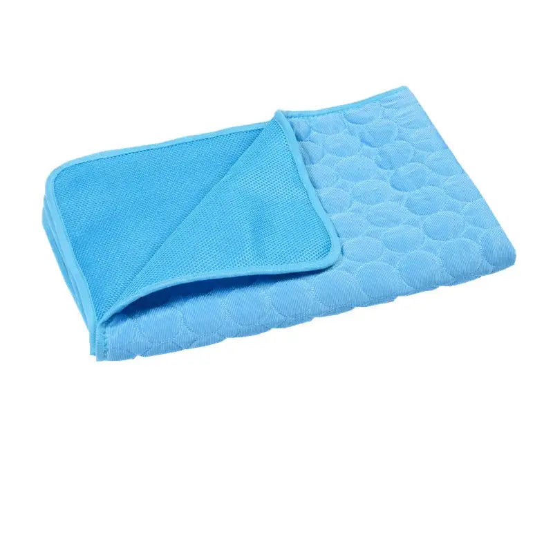 Light blue textured bath towel with a quilted pattern.