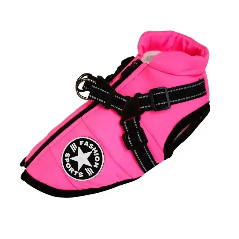 Bright pink dog harness with black straps and a star logo.