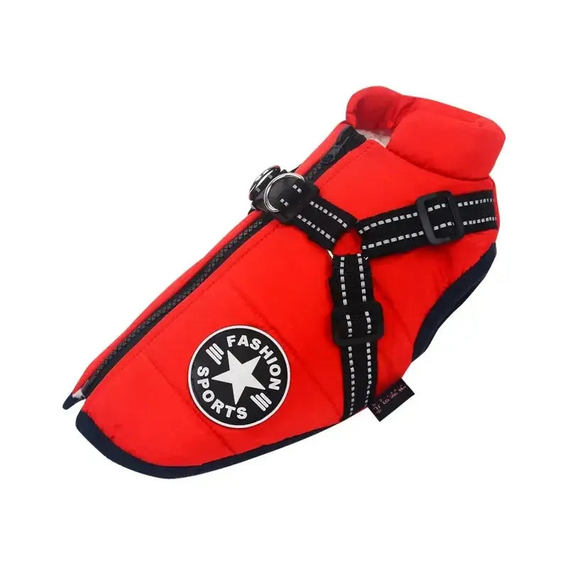 Red dog shoe or bootie with black straps and a circular logo patch.