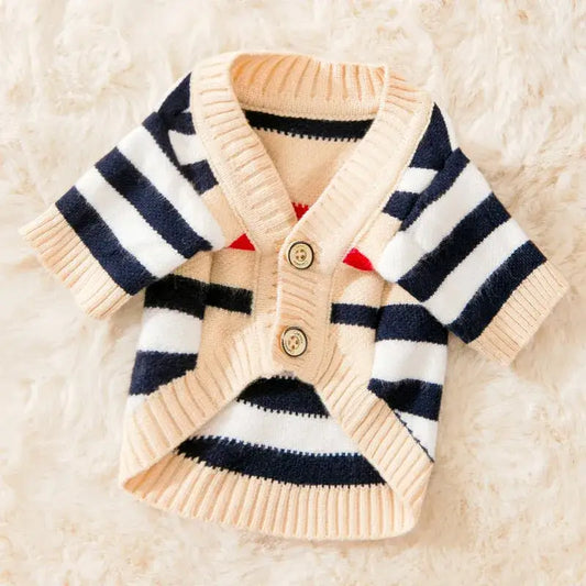 Striped knit cardigan sweater with beige trim and two buttons.