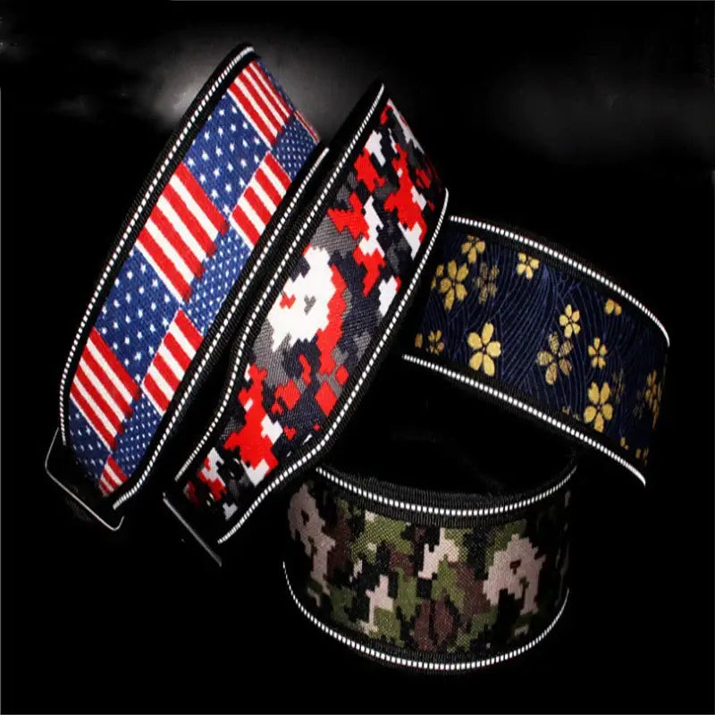 Assortment of patterned fabric or ribbon bands featuring American flags, camouflage, and floral designs.